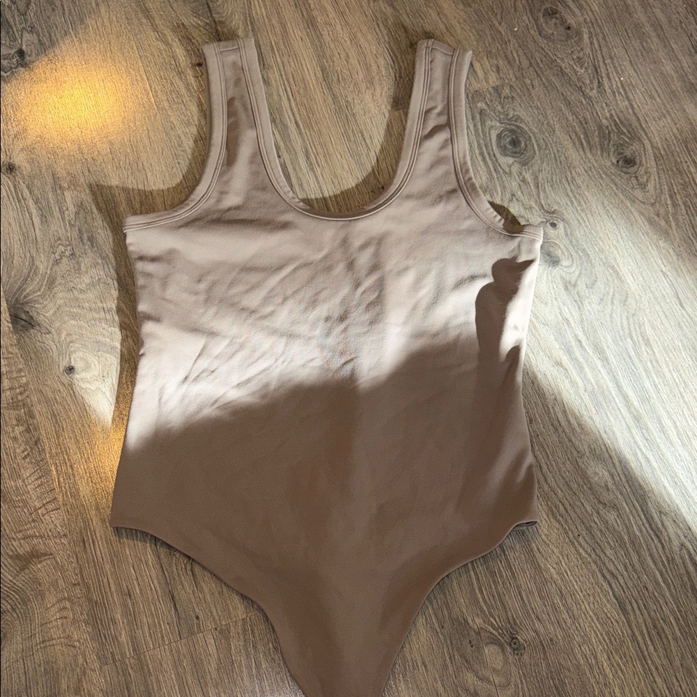 Nuuds Seamless Scoop Tank Bodysuit in Mocha!
